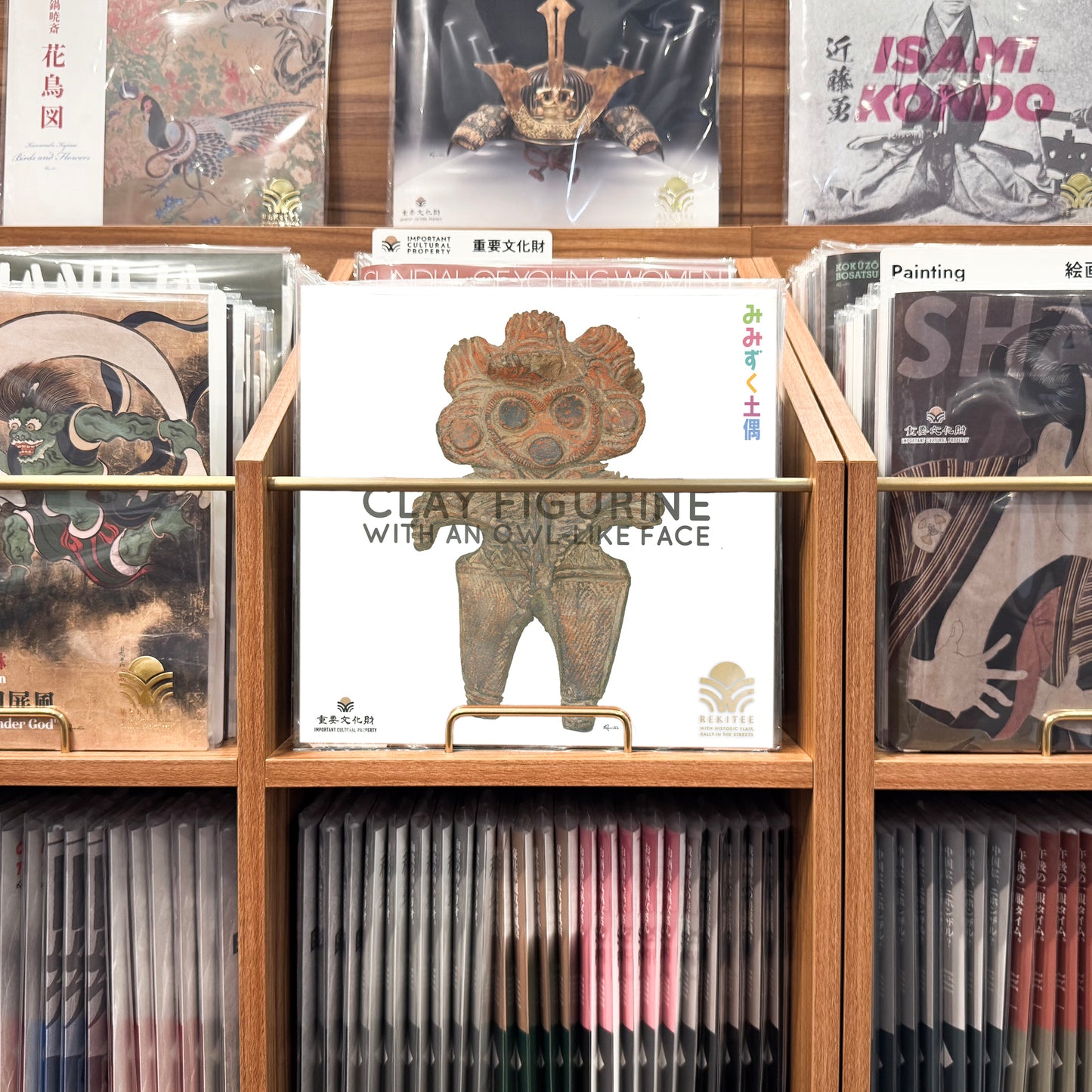 Clay Figurine with an Owl-Like Face